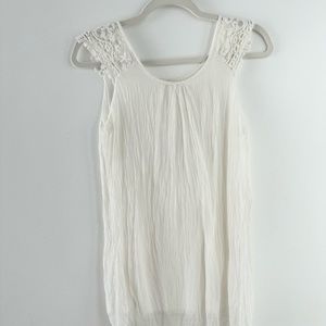 Sleeveless white top